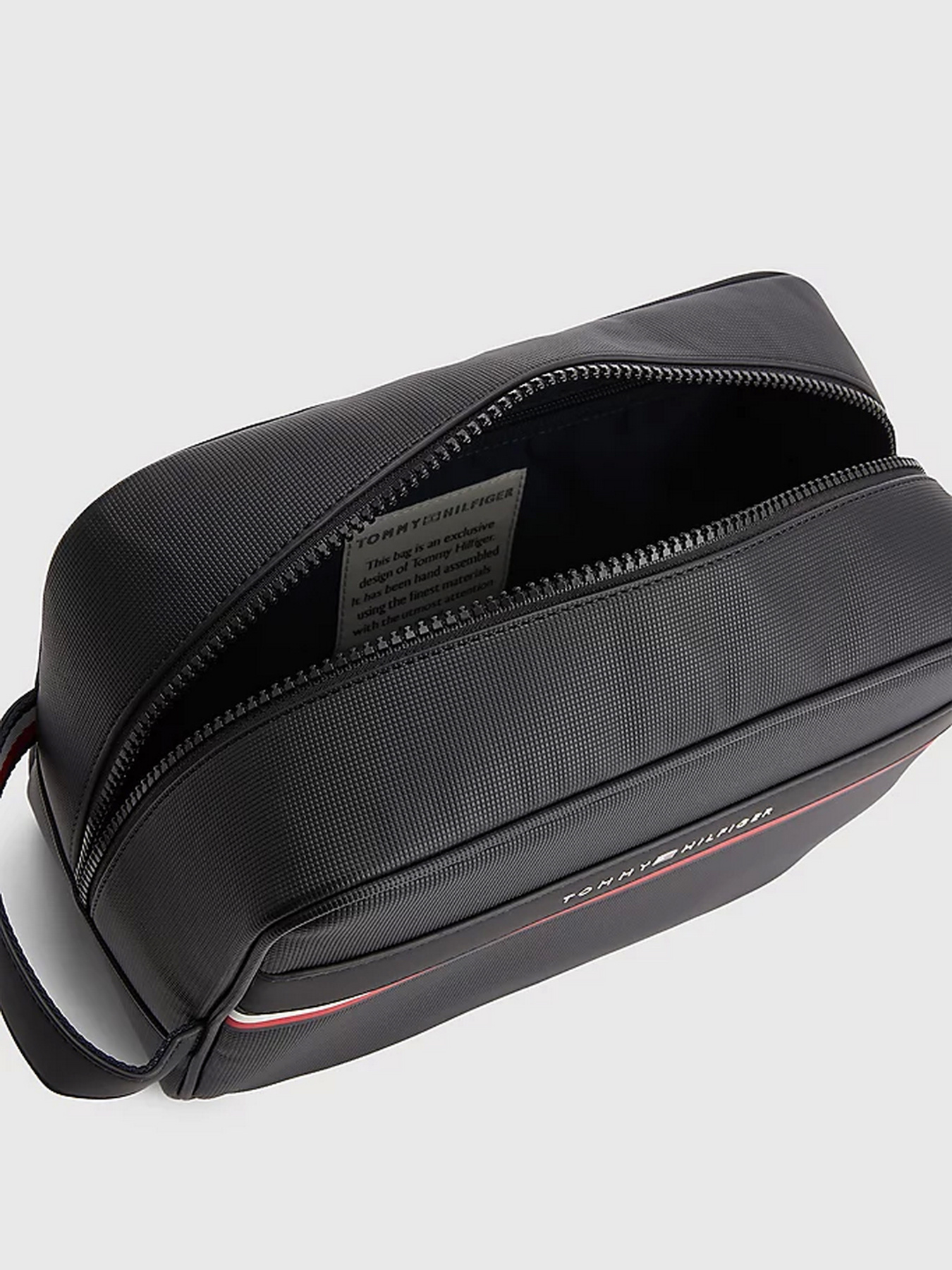 TH STRIPE WASHBAG Tommy Hilfiger модель AM0AM10507-BDS Фото