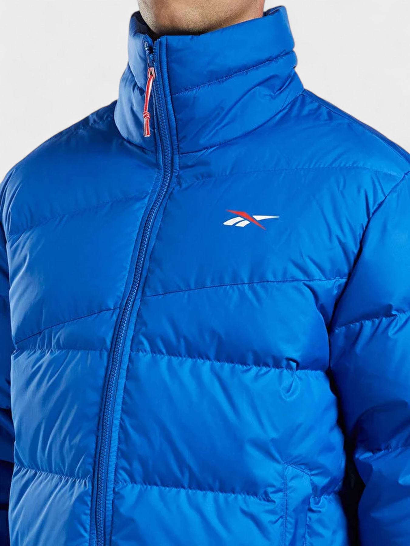 Куртки и дубленки Reebok модель HG8930 Фото