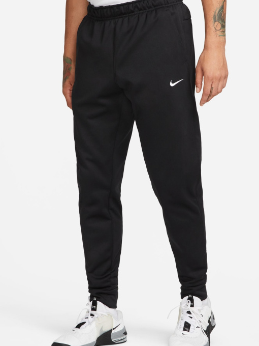 Брюки NIKE M NK TF PANT TAPER модель 101827202 Фото